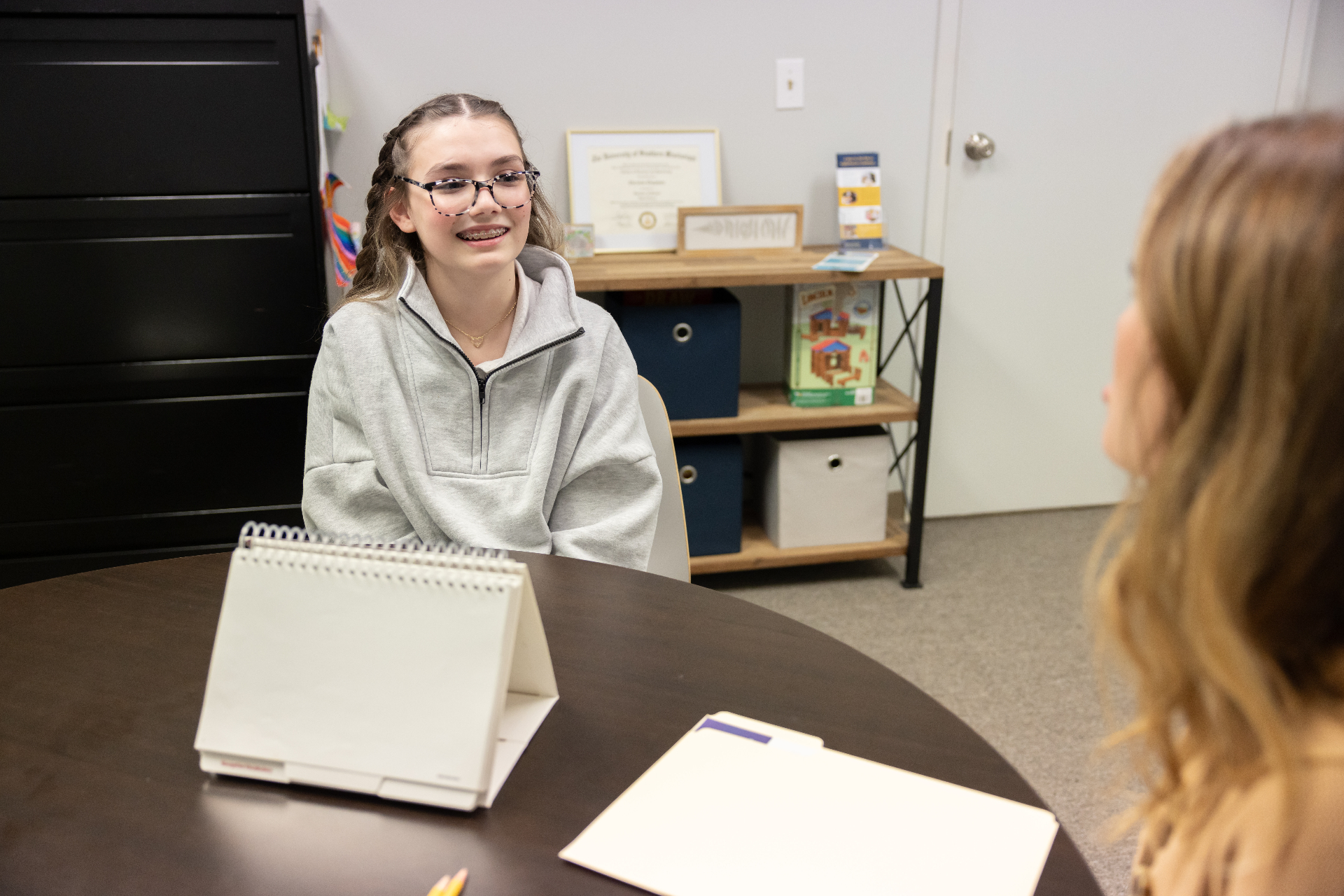 Teen smiling during a diagnostics session